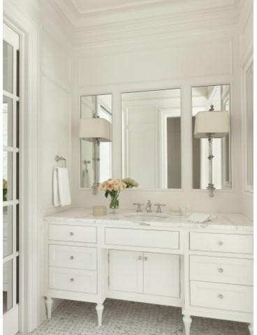 Inspiration for a mid-sized traditional master bathroom in St Louis with shaker cabinets, a freestanding tub, white walls, vinyl floors, a trough sink, marble benchtops, white cabinets, an open shower, gray tile, white tile, white floor and an open shower.