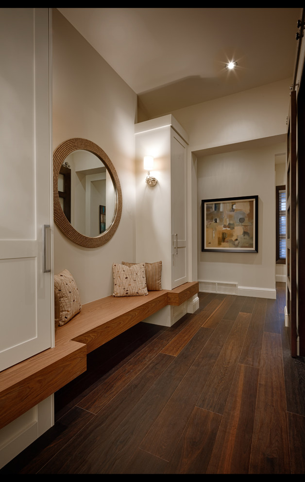 Transitional dark wood floor home design photo in Calgary with white walls