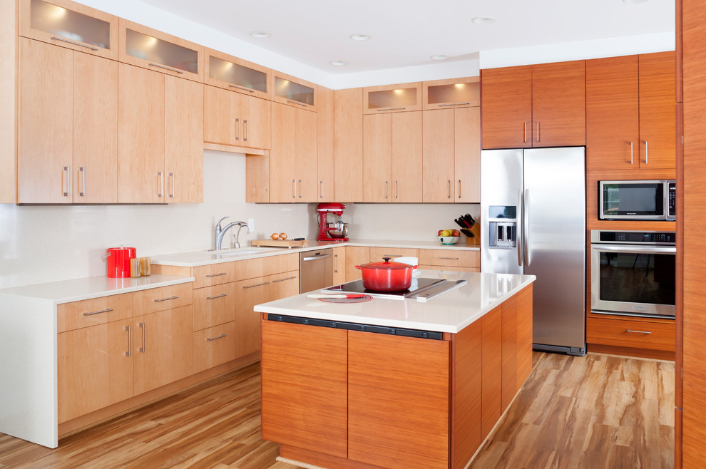 This is an example of a large contemporary l-shaped eat-in kitchen in DC Metro with medium hardwood floors and with island.