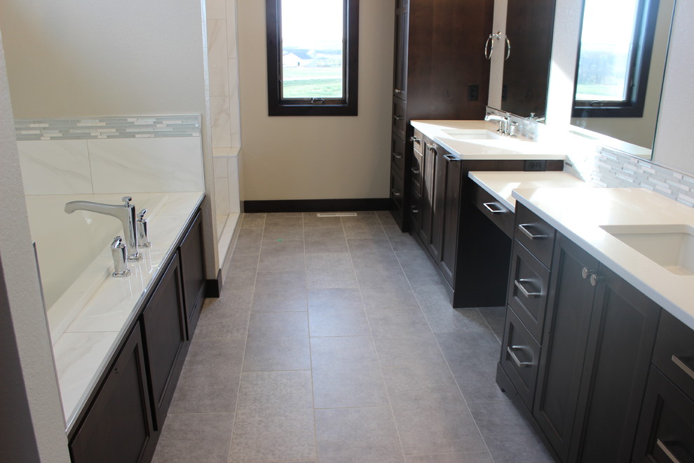 Inspiration for a large transitional master gray tile, white tile and matchstick tile porcelain tile bathroom remodel with shaker cabinets, dark wood cabinets, beige walls, an undermount sink and quartz countertops