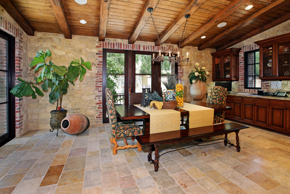 Inspiration for a large mediterranean kitchen/dining combo in Orange County with no fireplace.