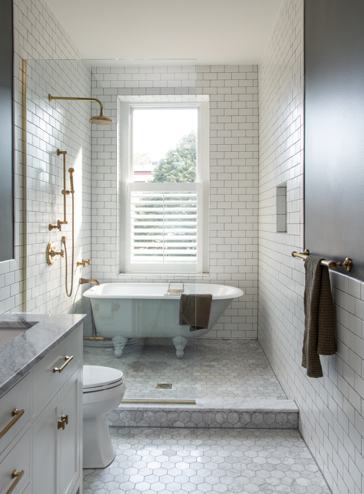 Mid-sized elegant master white tile and subway tile marble floor and double-sink bathroom photo in DC Metro with beaded inset cabinets, white cabinets, a two-piece toilet, blue walls, marble countertops and a freestanding vanity