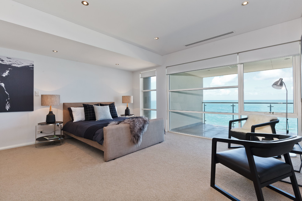 Design ideas for a contemporary master bedroom in Perth with grey walls and carpet.