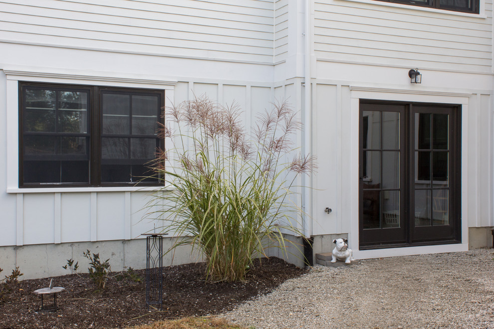 Example of a transitional exterior home design in Boston