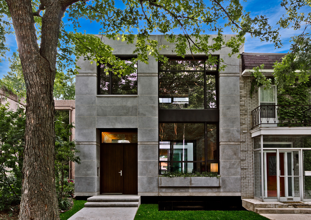 Photo of a contemporary two-storey exterior in Montreal.