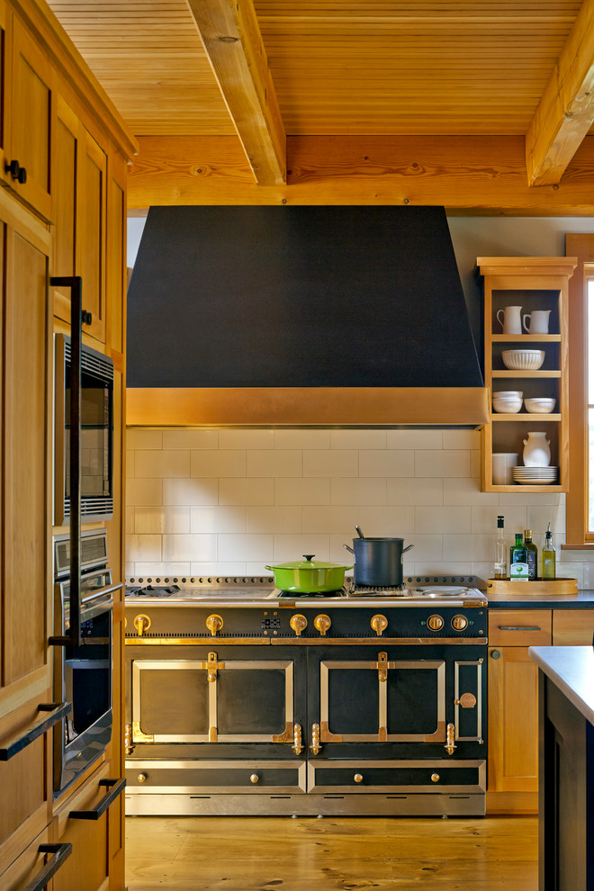 Example of a mountain style kitchen design in Burlington