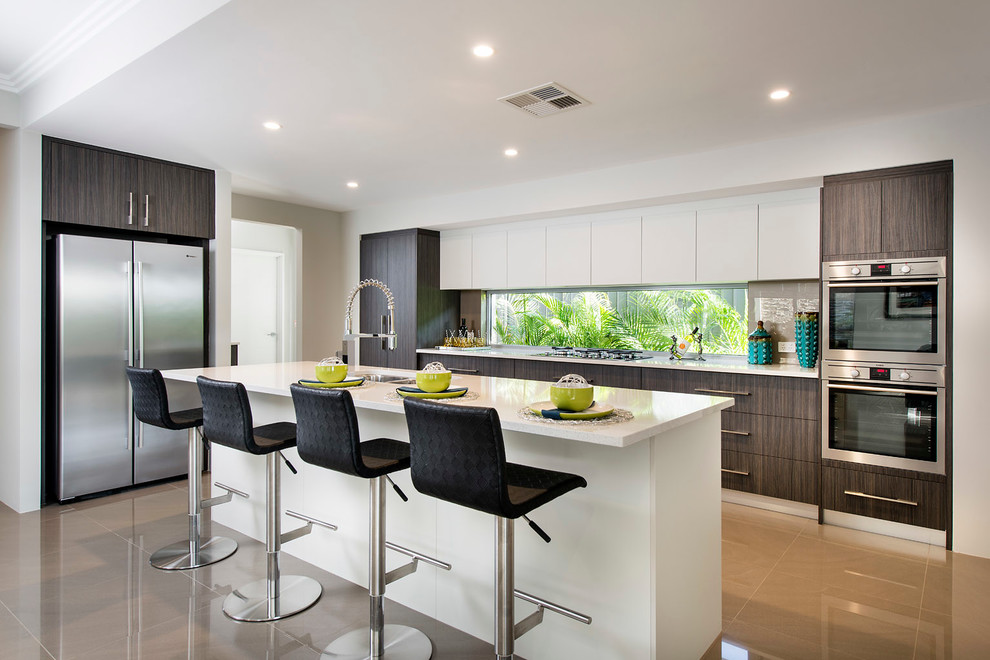 Photo of a mid-sized contemporary galley eat-in kitchen in Perth with an undermount sink, dark wood cabinets, quartz benchtops, brown splashback, glass sheet splashback, stainless steel appliances, porcelain floors and with island.