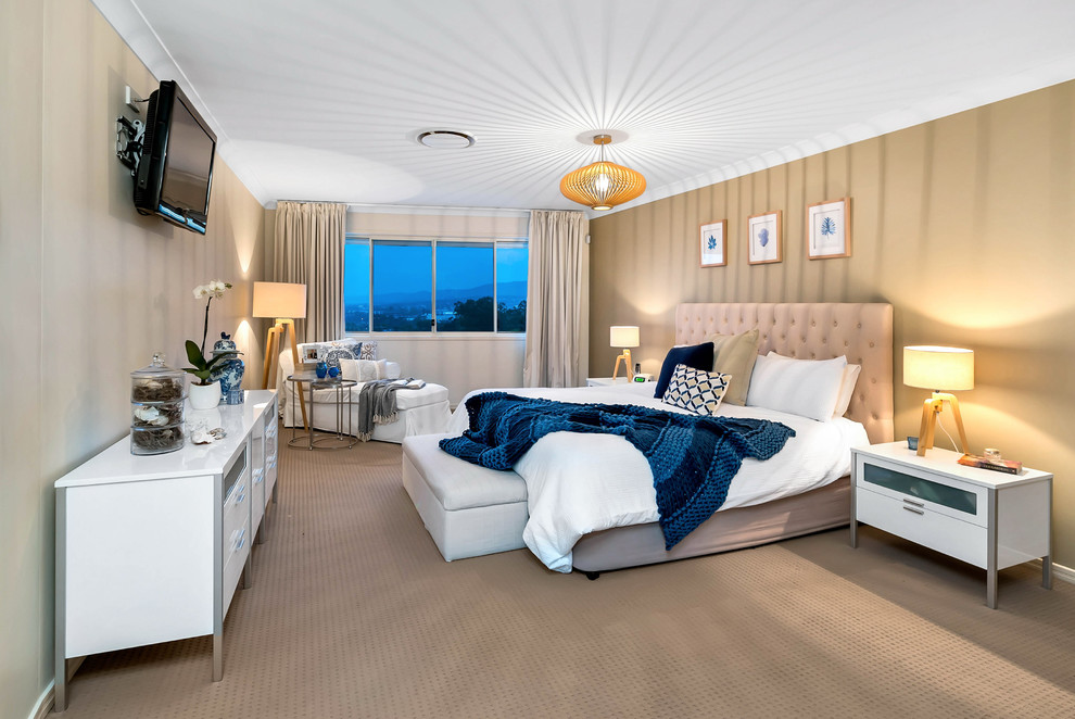 Design ideas for a transitional bedroom in Brisbane with beige walls, carpet and beige floor.