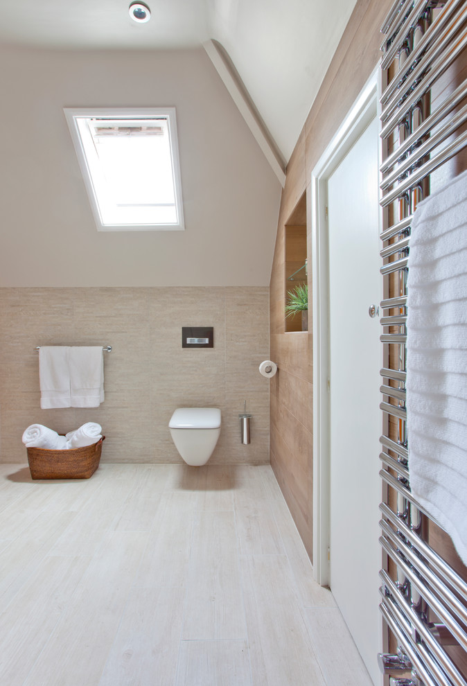 This is an example of a large contemporary 3/4 bathroom in Other with an open shower, a wall-mount toilet, beige tile, porcelain tile, orange walls and porcelain floors.