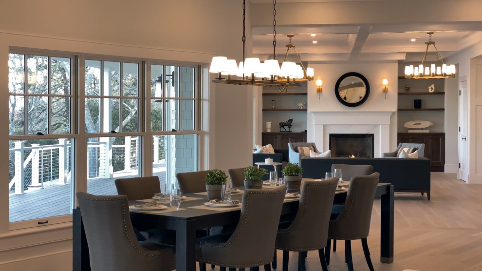 Inspiration for a large transitional light wood floor and beige floor kitchen/dining room combo remodel in Boston with white walls