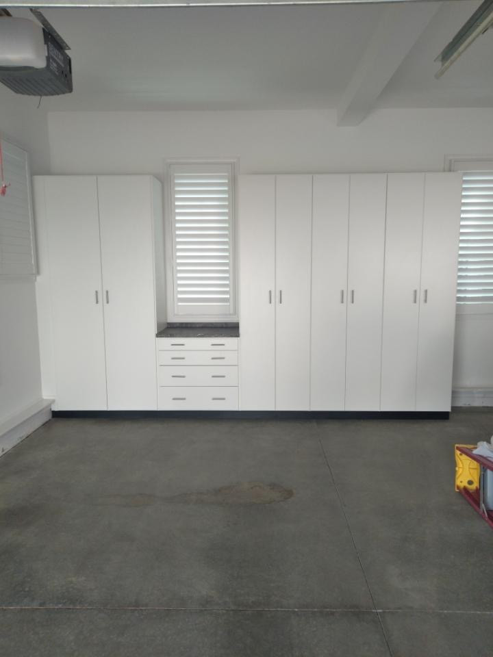Garage with Cabinets & Slat Wall