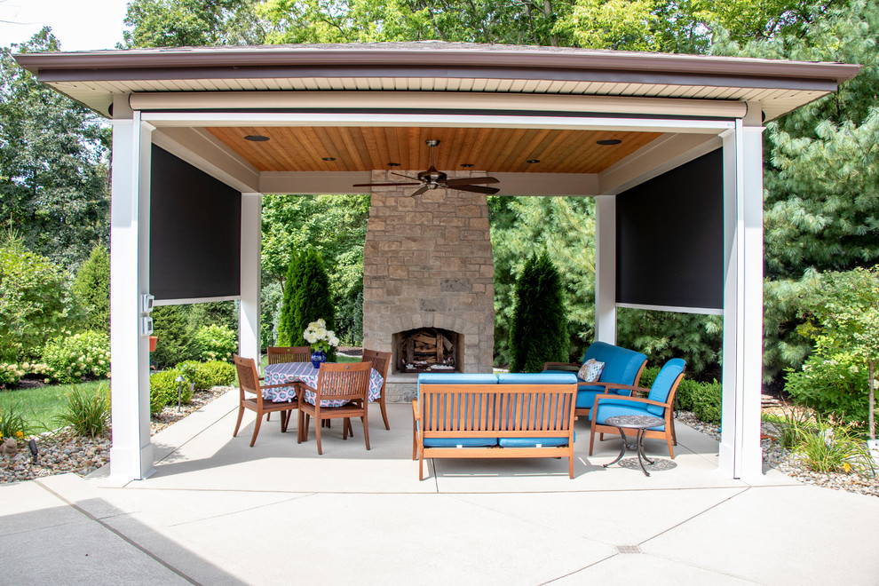 Photo of a mid-sized backyard patio in St Louis with concrete slab and a gazebo/cabana.