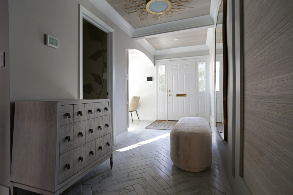 Example of a mid-sized transitional l-shaped marble floor, white floor and exposed beam kitchen design in DC Metro with an undermount sink, shaker cabinets, white cabinets, quartzite countertops, white backsplash, quartz backsplash and stainless steel appliances