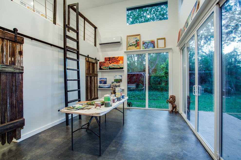 Design ideas for a contemporary home studio in Dallas with white walls and a freestanding desk.