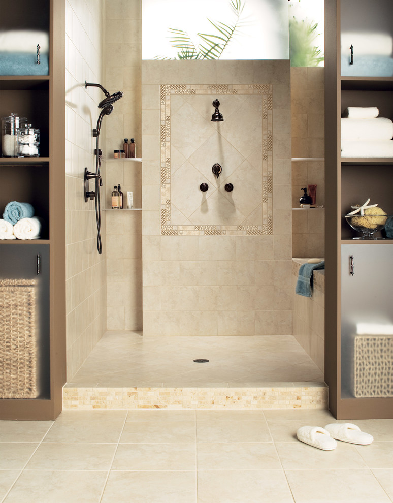 This is an example of a large beach style master bathroom in Charleston with open cabinets, brown cabinets, an open shower, beige tile, porcelain tile and porcelain floors.