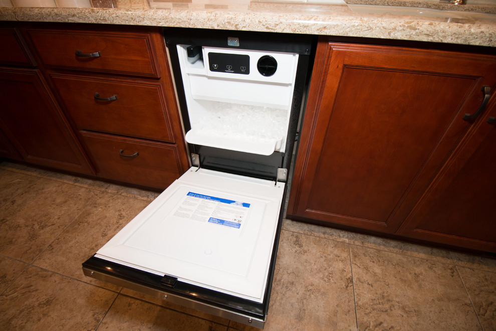Example of a large transitional u-shaped porcelain tile kitchen design with an undermount sink, flat-panel cabinets, medium tone wood cabinets, quartz countertops, beige backsplash, mosaic tile backsplash, stainless steel appliances and an island