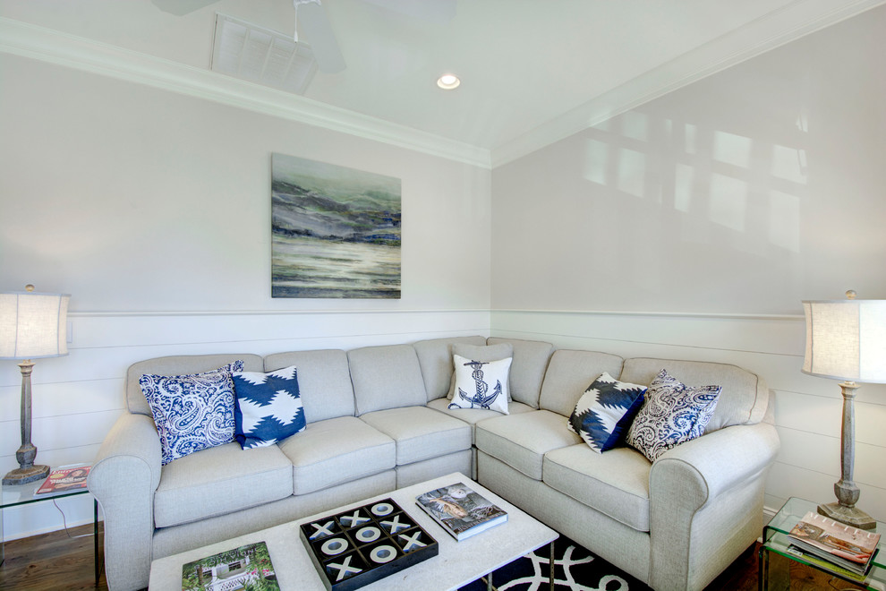 This is an example of a beach style family room in Dallas.