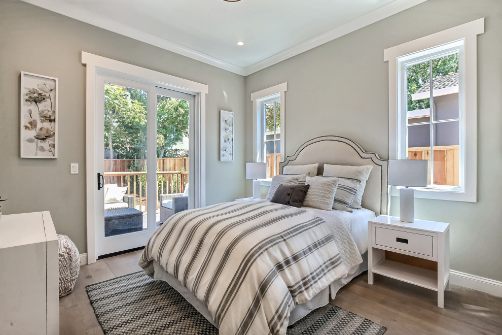 Medium sized classic master bedroom in San Francisco with grey walls, medium hardwood flooring and grey floors.