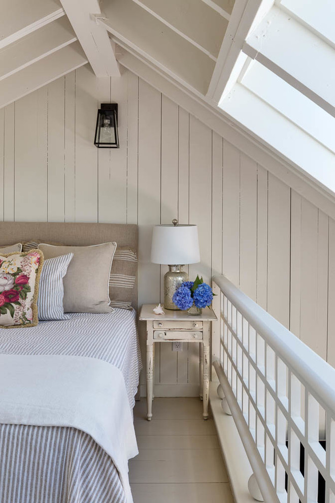 Bedroom - small coastal loft-style light wood floor bedroom idea in Boston with white walls and no fireplace