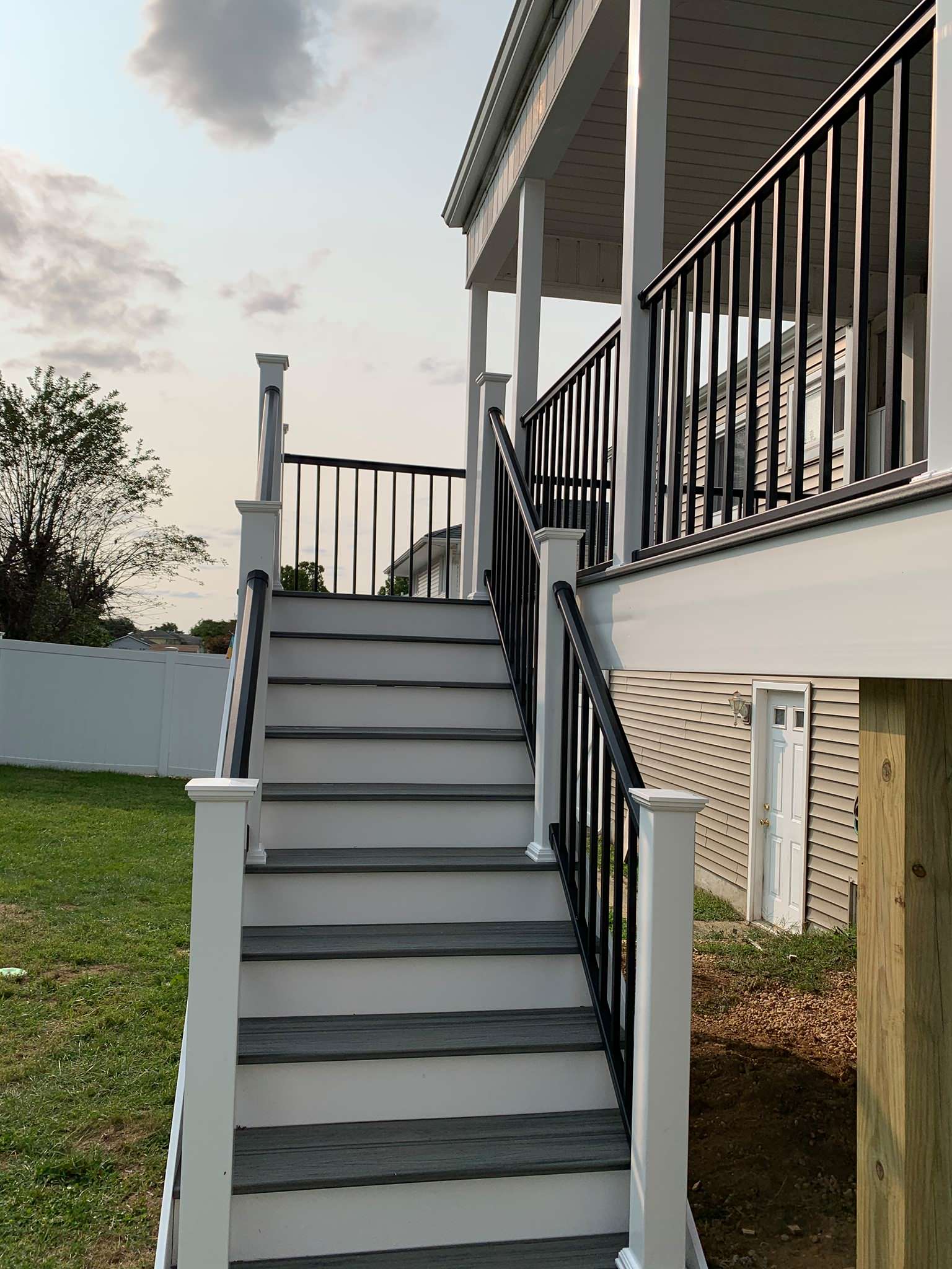Resurfaced old deck with Trex transcends Island Mist Color