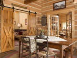 Farmhouse Dining Room by TIMBERHAVEN LOG & TIMBER HOMES