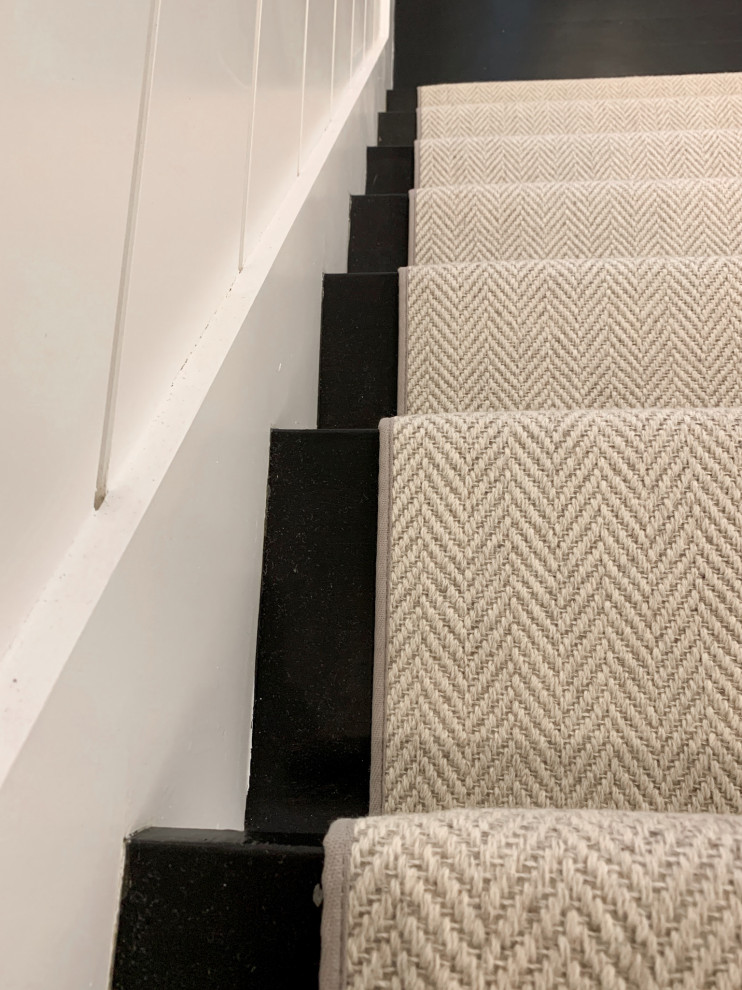 This is an example of a large carpeted l-shaped staircase in Boston.