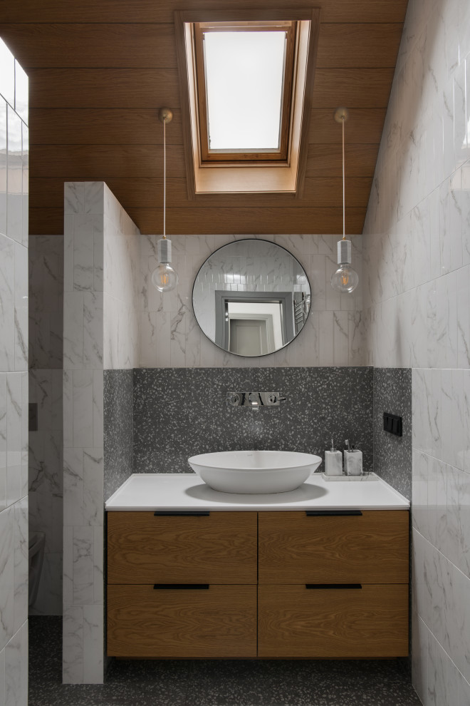 Photo of a small contemporary master bathroom in Moscow with flat-panel cabinets, white cabinets, an alcove shower, a wall-mount toilet, green tile, ceramic tile, green walls, porcelain floors, an undermount sink, solid surface benchtops, grey floor, a sliding shower screen, grey benchtops, an enclosed toilet, a single vanity, a freestanding vanity and wood.