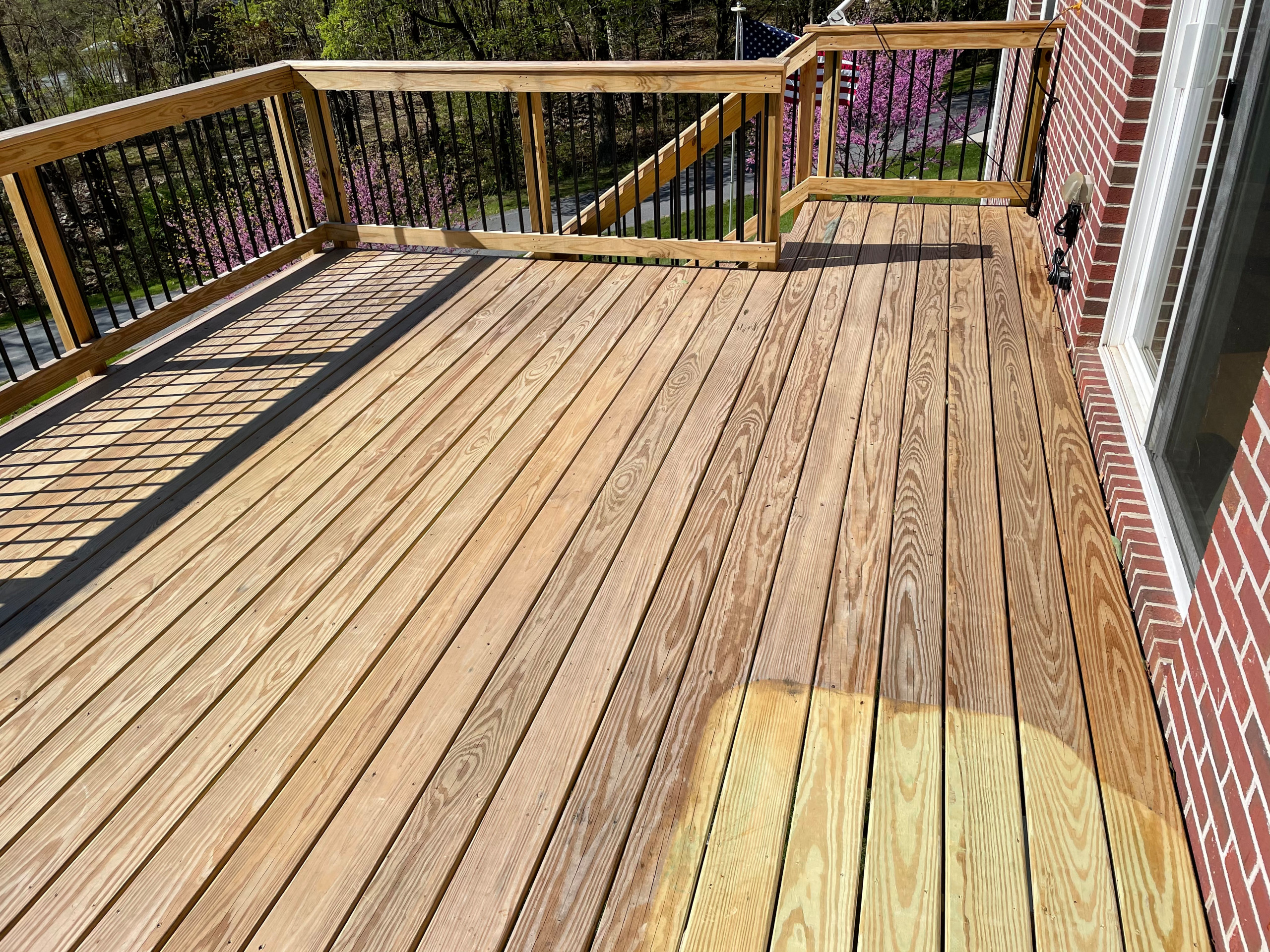 Deck stain and gutters power wash