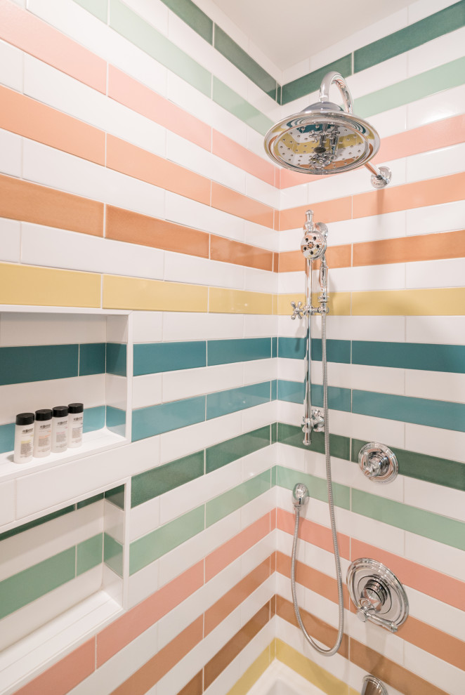 Photo of a small eclectic bathroom in Portland with a shower/bathtub combo, multi-coloured tile, ceramic floors, a console sink, white floor, a sliding shower screen, a single vanity and a freestanding vanity.