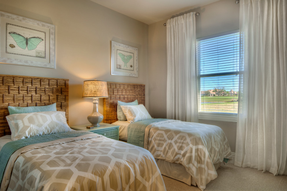 Beach style bedroom photo in Tampa with gray walls