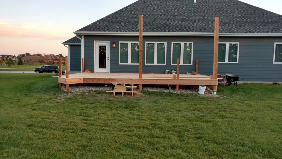 Deck - large rustic deck idea with a pergola