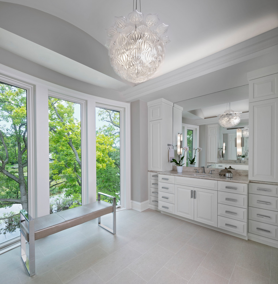 Expansive transitional master bathroom in Detroit with raised-panel cabinets, white cabinets, grey walls, travertine floors, an undermount sink, marble benchtops, beige floor and pink benchtops.