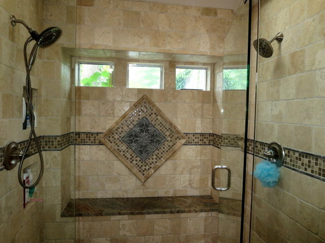 Alcove shower - large transitional master beige tile and brown tile marble floor alcove shower idea in Dallas with beige walls