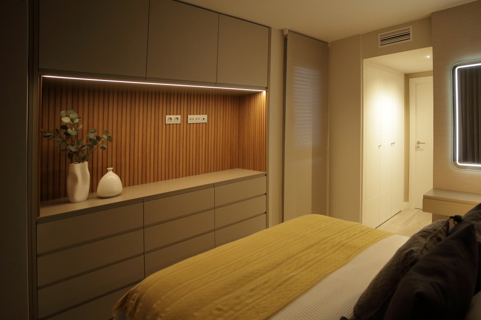 Bedroom - mid-sized modern master light wood floor, gray floor and wallpaper bedroom idea in Madrid with beige walls
