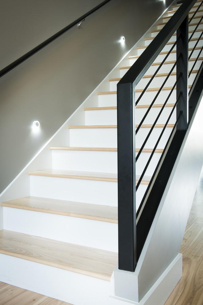 Staircase - mid-sized transitional wooden straight staircase idea with painted risers