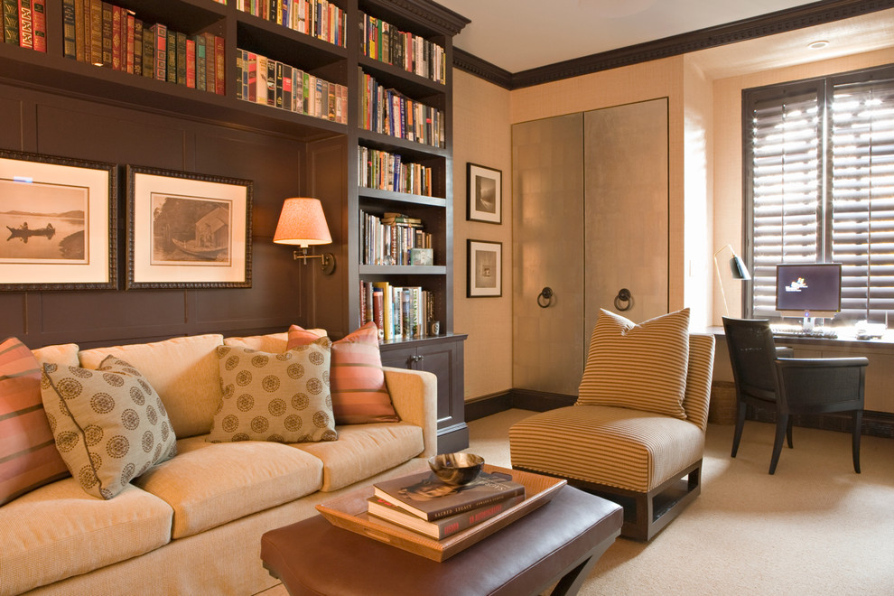 Large trendy freestanding desk carpeted study room photo in New York with beige walls