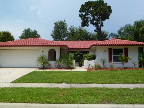 Peaceful White House With Red Tile Roof and black accent | Old ...