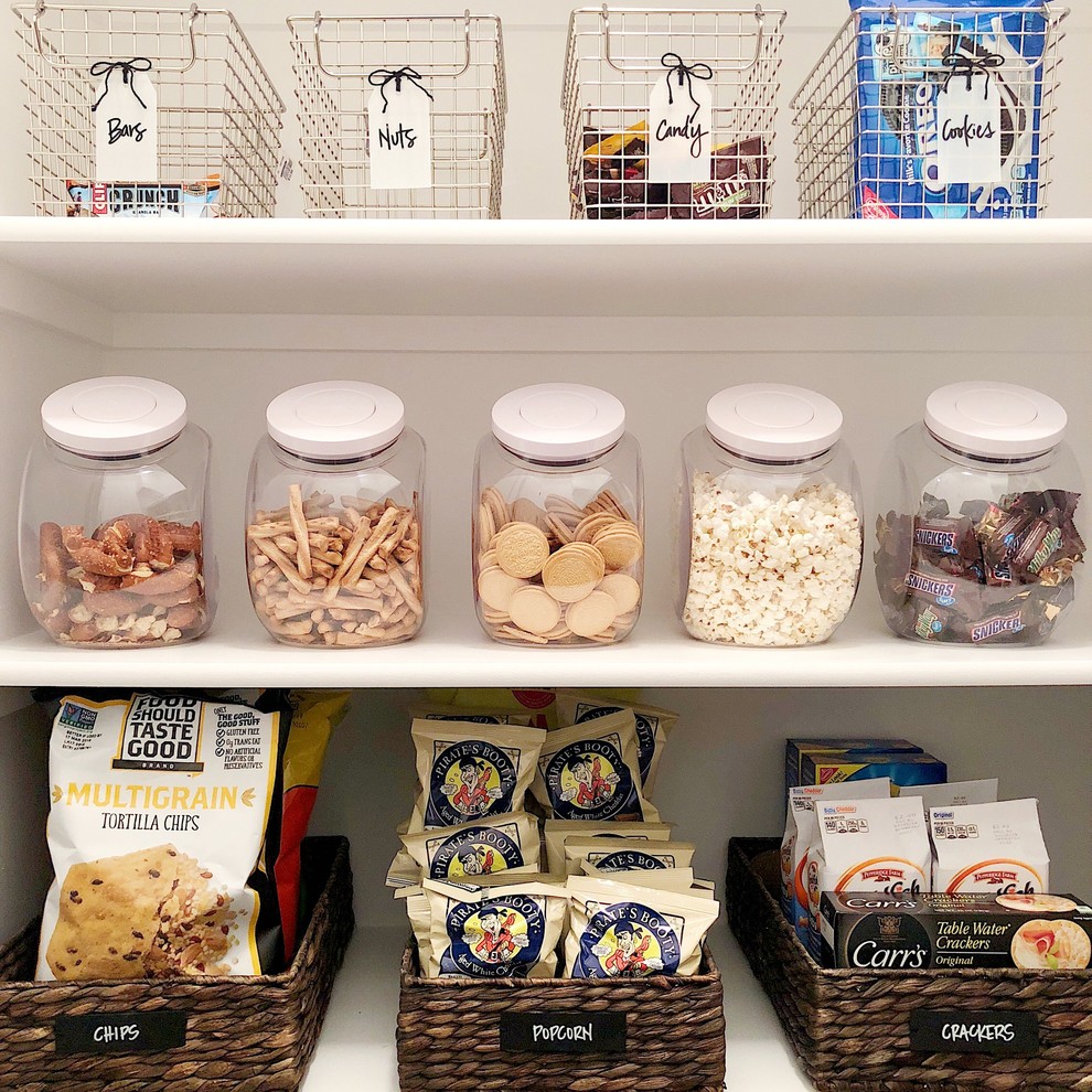 Kitchen pantry - mid-sized transitional kitchen pantry idea in Santa Barbara with open cabinets and white cabinets