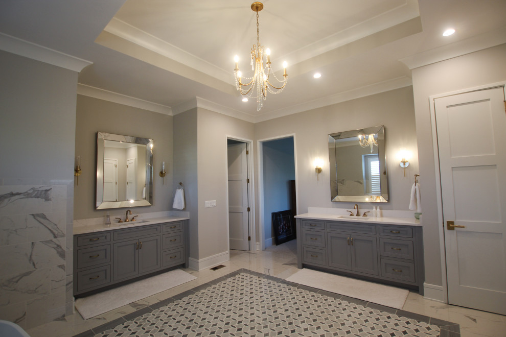 Large modern master bathroom in Indianapolis with flat-panel cabinets, grey cabinets, a freestanding tub, a double shower, white tile, ceramic tile, grey walls, cement tiles, an undermount sink, quartzite benchtops, grey floor, an open shower, white benchtops, a niche, a double vanity, a built-in vanity and coffered.