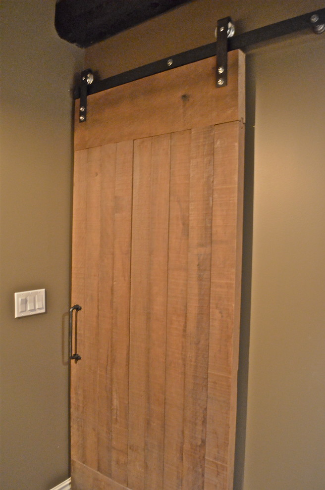 Home design - rustic ceramic tile ceramic tile home design idea in Omaha with wood countertops