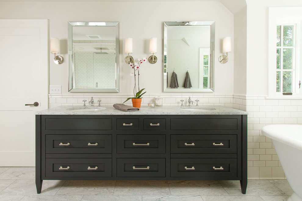 Inspiration for a transitional master bathroom in Minneapolis with an undermount sink, marble benchtops and black cabinets.