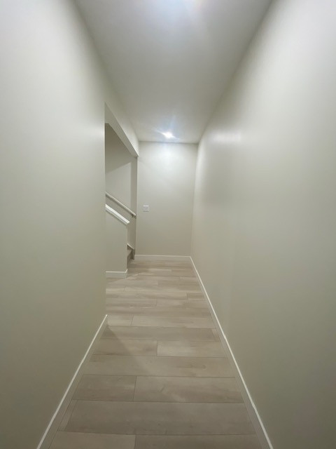Example of a transitional hallway design in Edmonton