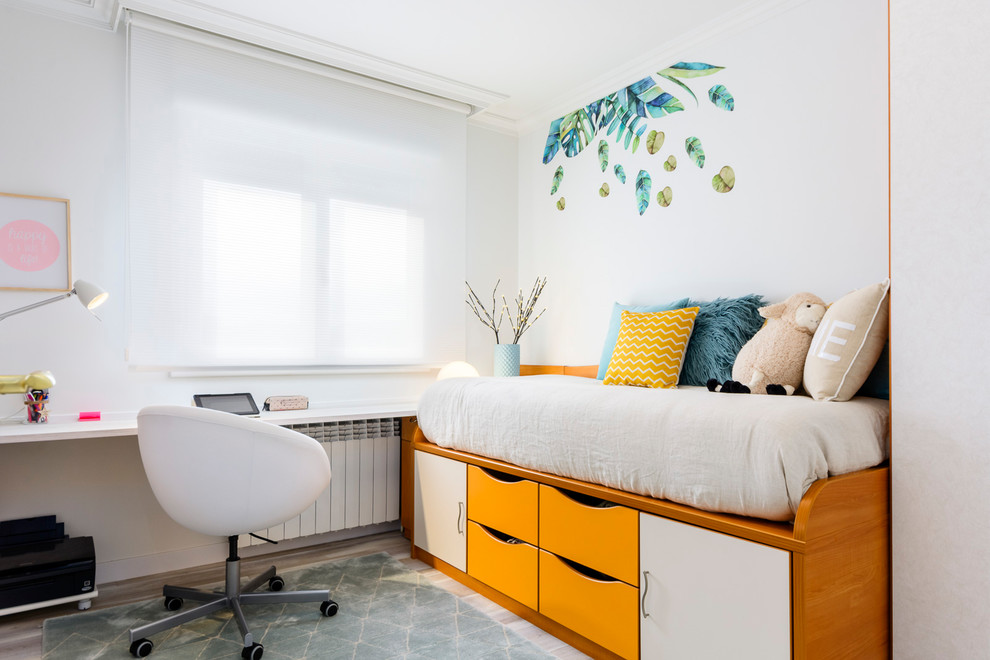 Contemporary gender-neutral kids' bedroom in Other with white walls.