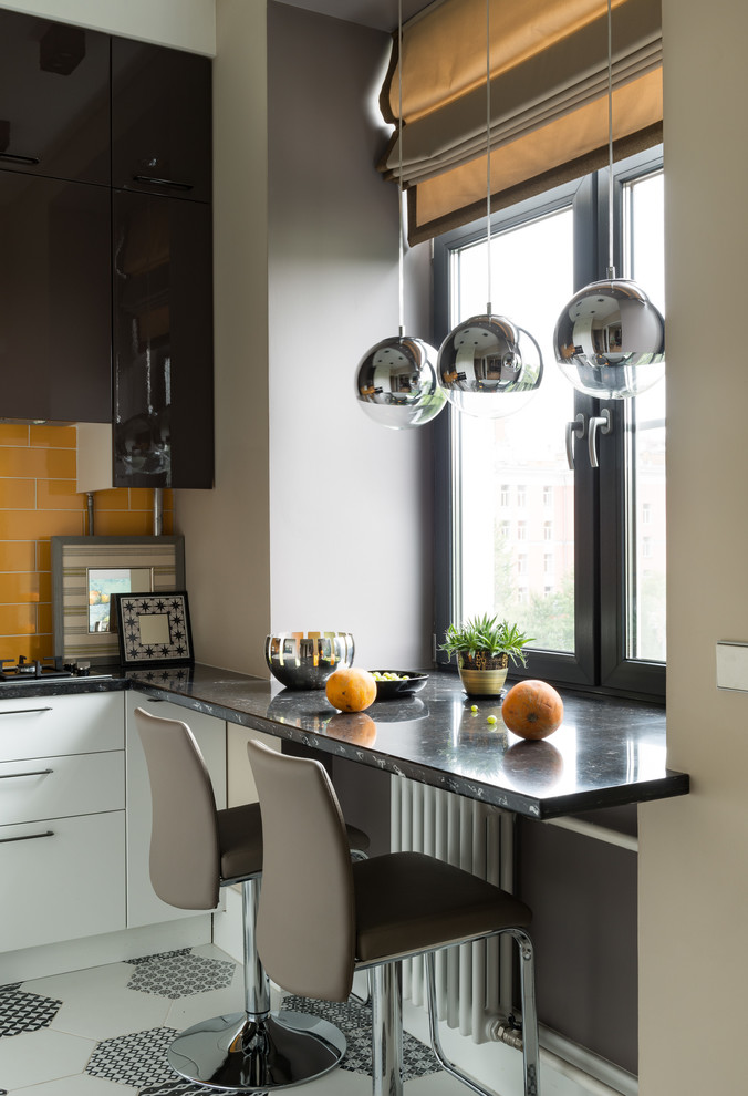 Inspiration for a small contemporary l-shaped separate kitchen in Moscow with flat-panel cabinets, solid surface benchtops, orange splashback, ceramic splashback, white floor, black benchtop, an undermount sink, black appliances, porcelain floors, no island and recessed.
