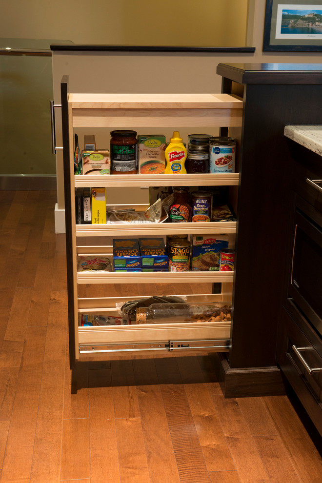 Example of a transitional home design design in Vancouver