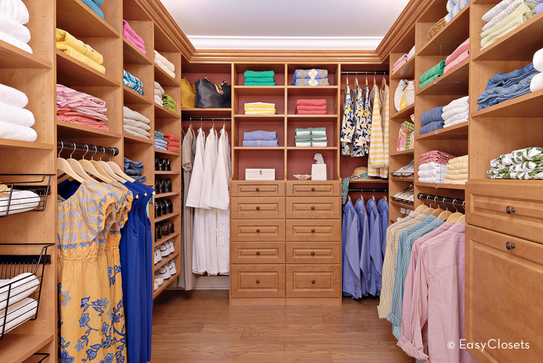 Photo of an expansive traditional walk-in wardrobe in Miami.