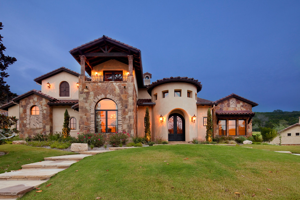 This is an example of a mediterranean brick exterior in Austin.