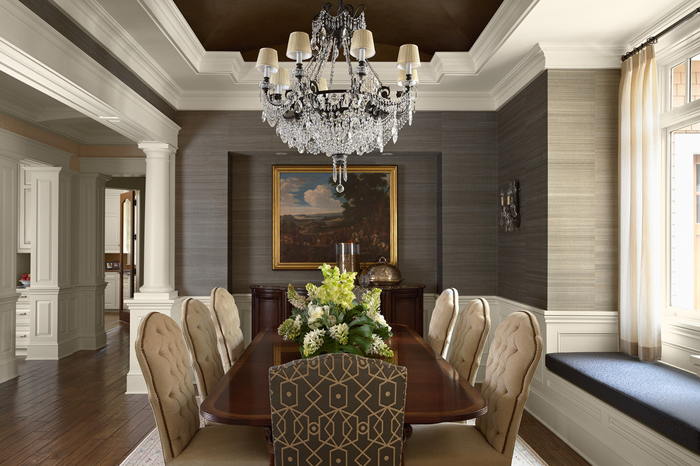 Inspiration for a traditional dining room in Minneapolis with grey walls and dark hardwood floors.