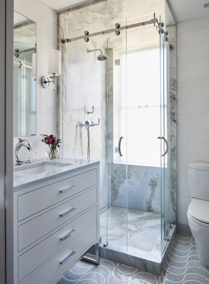 Design ideas for a contemporary bathroom in New York with flat-panel cabinets, white cabinets, a corner shower, gray tile, mosaic tile floors, an undermount sink, grey floor, a hinged shower door, white benchtops, a single vanity and a freestanding vanity.