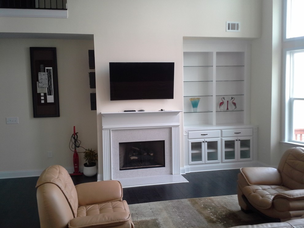 Fireplace Builtin with glass shelves and doors Traditional Atlanta